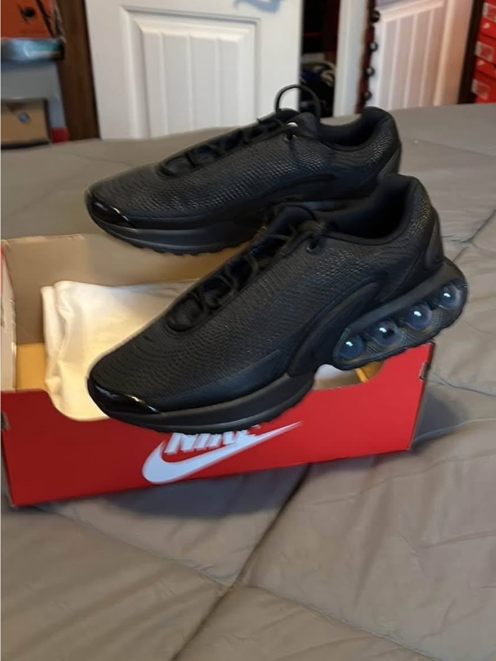 Nike Air Max DN Men’s All-Black Cushion Air Sneakers
